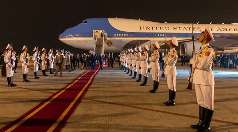 President Donald J. Trump, escorted by Mai Phuoc Dung, Director General of State Protocol of the Socialist Republic of Vietnam, walks along a red carpet from Air Force One and reviews an Honor Cordon upon his arrival Tuesday, Feb. 26, 2019, at Noi Bai International Airport in Hanoi. (Official White House Photo by Shealah Craighead)