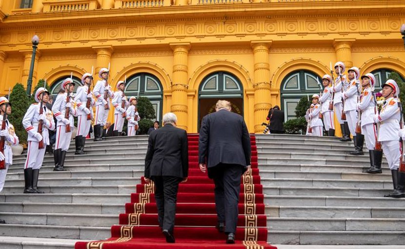 President Donald J. Trump walks up the stairs passing an Honors Cordon with Nguyen Phu Trong, General Secretary of the Communist Party and President of the Socialist Republic of Vietnam, on President Trump’s arrival to the Presidential Palace Wednesday, Feb. 27, 2019, in Hanoi. (Official White House Photo by Shealah Craighead)