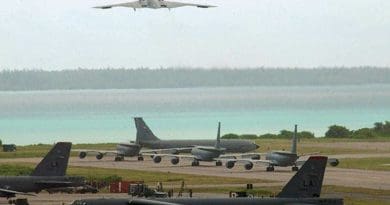 A B-2 bomber takes off, with B-52 bombers on tarmac on Diego Garcia. Photo Credit: U.S. Air Force photo by Senior Airman Nathan G. Bevier