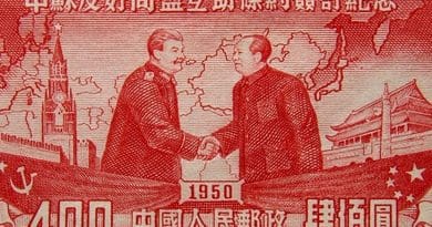 Detail of Chinese stamp of Russia's Stalin shaking hands with China's Mao Zedong