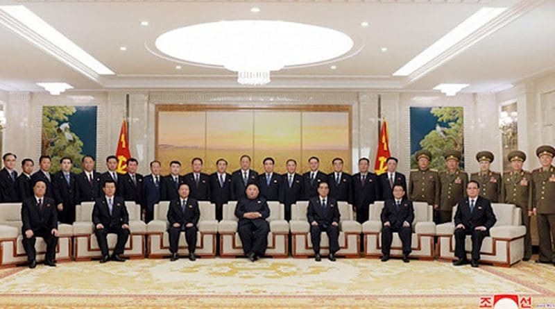 North Korea's Kim Jong Un has photo session with newly-elected members of Party and State leadership bodies. Credit: KCNA.