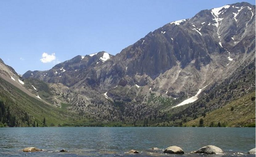 Looking southwest across Convict Lake, Mono County, California, toward Laurel Mountain and the upturned meta-sedimentary strata under which some of the seasonal swarms occur. Credit Emily Montgomery-Brown