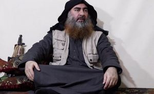 Islamic State leader Abu Bakr al-Baghdadi. Photo Credit: Screenshot from video released by Islamic State's al-Furqan Media