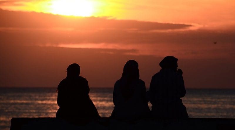 arab muslim women red sea sunset