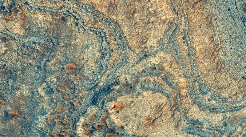 New research shows that a strange Martian mineral deposit, imaged here from orbit, was likely made by ashfall from ancient volcanic explosions. Credit NASA/Christopher Kremer/Brown University