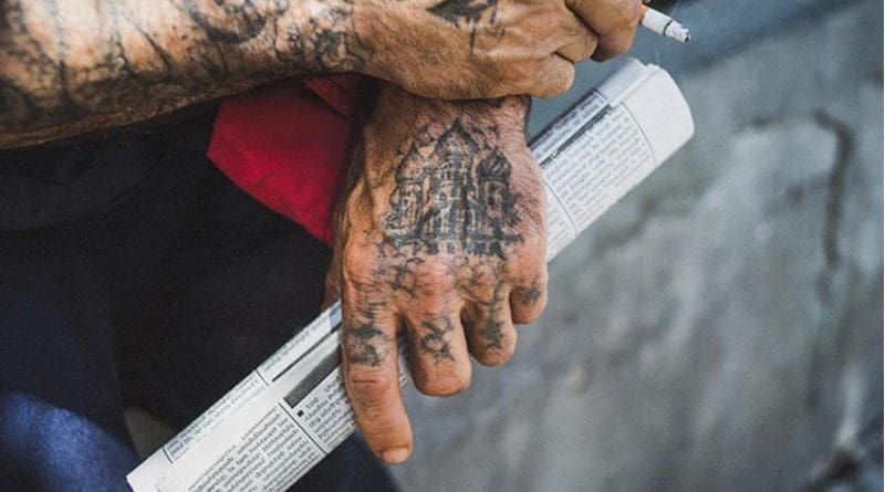 Man with tattoos. Photo: Creative Commons, Theo Paul