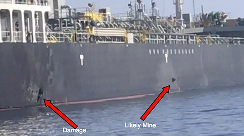 This June 13, 2019, image released by the U.S. military's Central Command, shows damage and a suspected mine on the Kokuka Courageous in the Gulf of Oman near the coast of Iran.