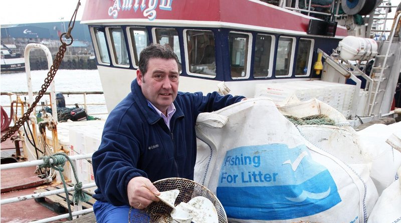 Amity skipper Jimmy Buchan with some of the litter caught by his vessel. Credit Fishing for Litter