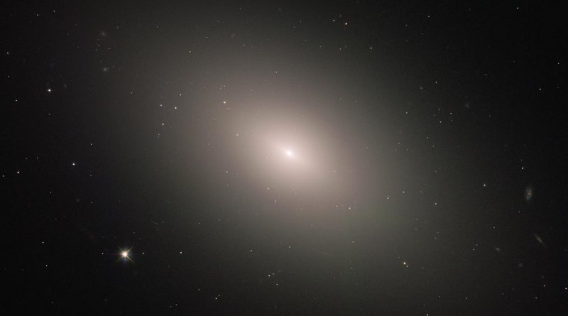 This luminous orb is the galaxy NGC 4621, better known as Messier 59. As this latter moniker indicates, the galaxy is listed in the famous catalog of deep-sky objects compiled by French comet-hunter Charles Messier in the 18th century. Credit ESA/Hubble & NASA, P. Cote