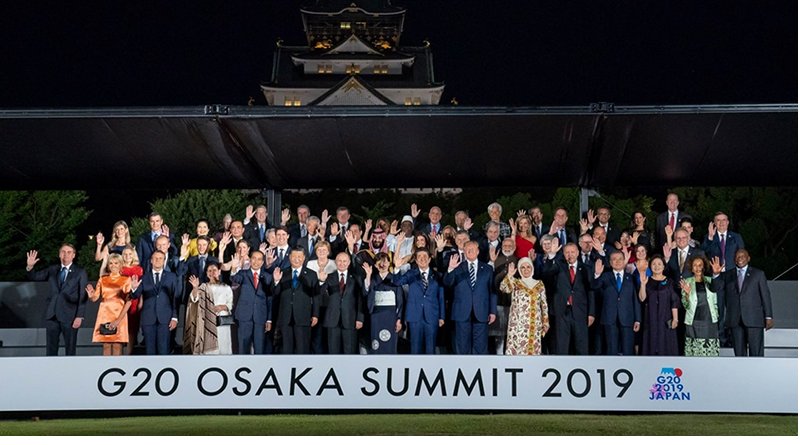 President Donald J. Trump participates in a group photo during G20 Cultural Program at the Osaka Geihinkan with fellow leaders attending G20 Japan Summit Friday, June 28, 2019, in Osaka, Japan. (Official White House Photo by Tia Dufour)