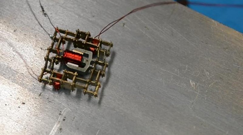his walking microrobot was built by the MIT team from a set of just five basic parts, including a coil, a magnet, and stiff and flexible structural pieces. Credit Will Langford