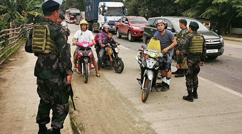 Philippine soldiers conduct checks of motorists in southern Zamboanga province following the arrests of two suspected Pakistani militants, July 12, 2019. Photo Credit: Mark Navales/BenarNews