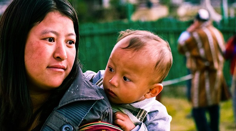 Woman with child in Bhutan