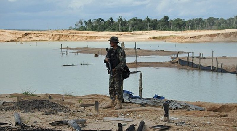 Peruvian soldier participating in "Mercurio 2019" against illegal mining. Photo Credit: Peru's Ministry of Interior