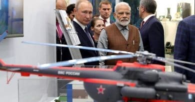 Russia's President Vladimir Putin with Prime Minister of India Narendra Modi during a tour of the Far East Street exhibition. Photo Credit: Kremlin.ru