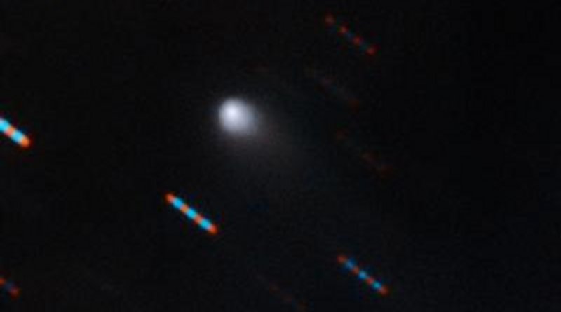 Gemini Observatory two-color composite image of C/2019 Q4 (Borisov) which is the first interstellar comet ever identified. This image was obtained using the Gemini North Multi-Object Spectrograph (GMOS) from Hawaii's Maunakea. The image was obtained with four 60-second exposures in bands (filters) r and g. Blue and red dashes are images of background stars which appear to streak due to the motion of the comet. Composite image by Travis Rector. Credit Gemini Observatory/NSF/AURA