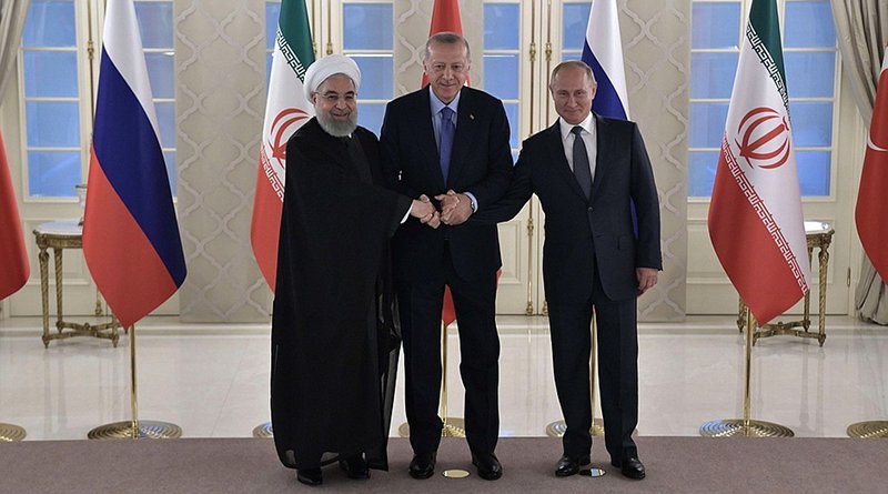 Meeting between the leaders of the guarantor states of the Astana process on the settlement in Syria. Russian President Vladimir Putin with President of Turkey Recep Tayyip Erdogan (centre) and President of Iran Hassan Rouhani. Photo Credit: Kremlin.ur