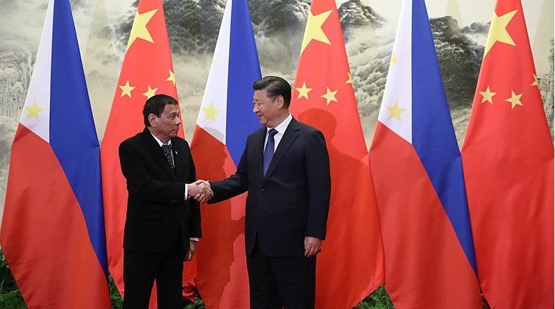 President Rodrigo Duterte and President Xi Jinping shake hands prior to their bilateral meetings at the Great Hall of the People in Beijing. Photo Credit: King Rodriguez of Philippine Presidential Department, Wikimedia Commons