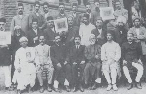 The  first Baha’i National Convention, held on the lawns of Bombay  University’s Fort campus, in 1920. From left, the multi-lingual Siyyid  Mustafa Rumi (fifth), who accompanied Baha’i teacher Jamal Effendi on  his tours; Narayan Rao Shethji Vakil (eighth), and just behind him,  Pritam Singh, the first Sikh to become a Baha’i.