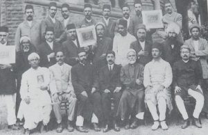 The first Baha’i National Convention, held on the lawns of Bombay University’s Fort campus, in 1920. From left, the multi-lingual Siyyid Mustafa Rumi (fifth), who accompanied Baha’i teacher Jamal Effendi on his tours; Narayan Rao Shethji Vakil (eighth), and just behind him, Pritam Singh, the first Sikh to become a Baha’i.