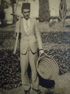 Faredoon Nooreyezdan, working in the gardens of the Shrine of the Bab on Mount Carmel, Haifa, in 1936.