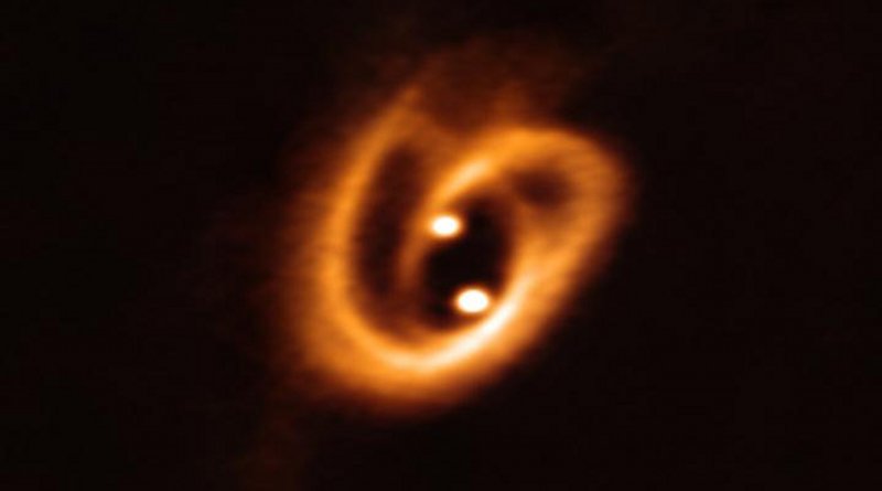 The Atacama Large Millimeter/submillimeter Array (ALMA) captured this unprecedented image of two circumstellar disks, in which baby stars are growing, feeding with material from their surrounding birth disk. The complex network of dust structures distributed in spiral shapes remind of the loops of a pretzel. These observations shed new light on the earliest phases of the lives of stars and help astronomers determine the conditions in which binary stars are born. Credit ALMA (ESO/NAOJ/NRAO), Alves et al.