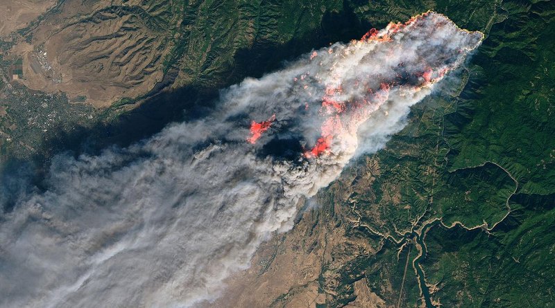 On the morning of Nov. 8, 2018, the Camp Fire erupted 90 miles north of Sacramento, California. By evening, the fast-moving fire had charred around 18,000 acres and remained zero percent contained. Credit NASA