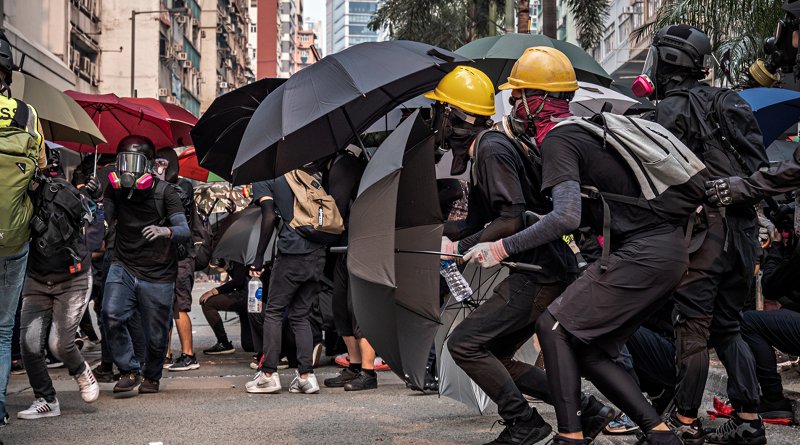 Hong Kong protestors wearing masks. Photo Credit: Studio Incendo, Wikimedia Commons