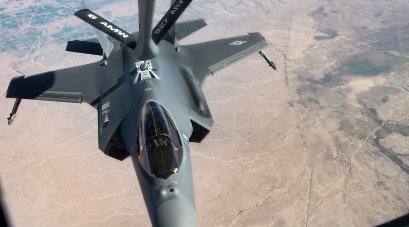 An F-35 joint strike fighter completes aerial refueling courtesy of a KC-135R Stratotanker, April 26, 2019. Photo By: Air Force Senior Airman Keifer Bowes