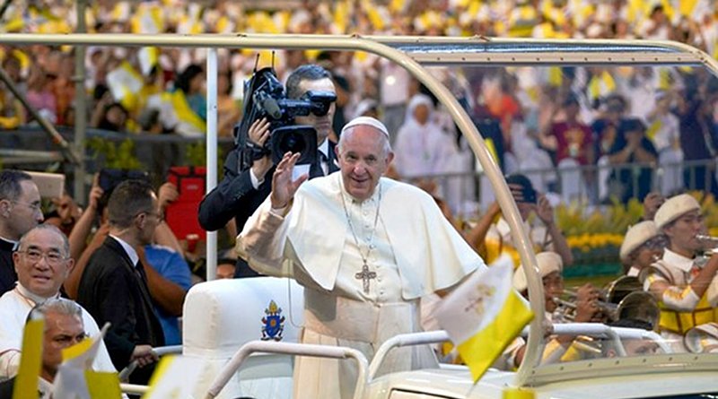Pope Francis waves as he arrives at the national sports stadium in Bangkok for an open-air Mass, Nov. 21, 2019. Photo Credit: Pimuk Rakkanam/BenarNews
