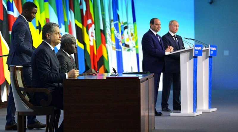 Eurasian Economic Commission Board Chairman Tigran Sargsyan and African Union Commission Chairman Moussa Faki Mahamat sign a Memorandum of Understanding between the Eurasian Economic Commission and the African Union on economic cooperation in Sochi, Russia. In the background is President of the Russian Federation Vladimir Putin and President of the Arab Republic of Egypt Abdelfattah Al-Sisi. Photo Credit: Kremlin.ru