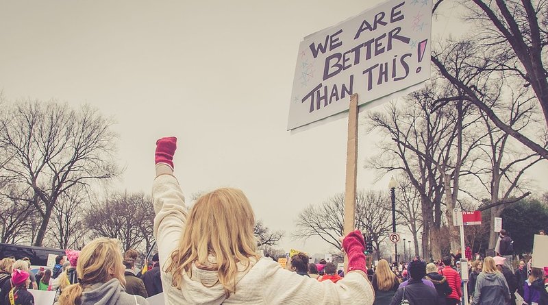 women protest trump racism