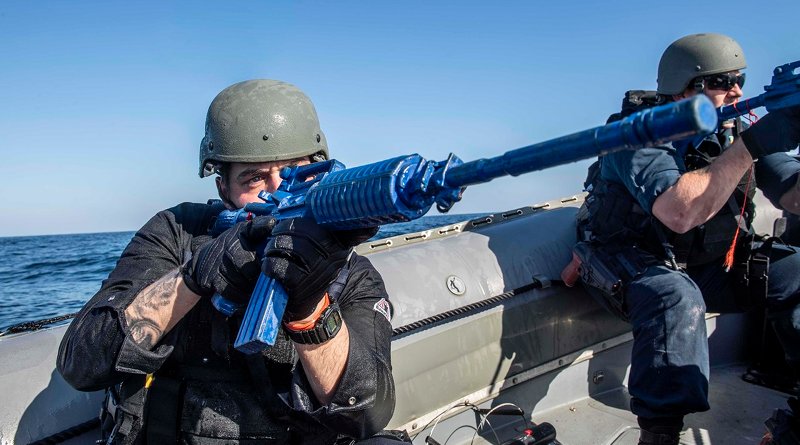 Sailors conduct a search and seizure operation in a rigid hull inflatable boat in the East China Sea. Photo Credit: Navy Petty Officer 2nd Class Taylor DiMartino