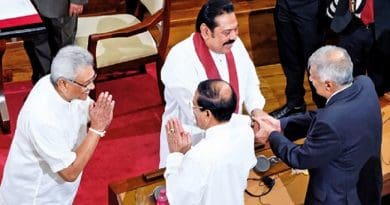 Sri Lanka's former Prime Minister Ranil Wickremesinghe congratulating his successor Mahinda Rajapaksa soon after he was sworn in at the Presidential Secretariat. With them are new President Gotabaya Rajapaksa and former President Maithripala Sirisena. Photo Credit: Sri Lanka government