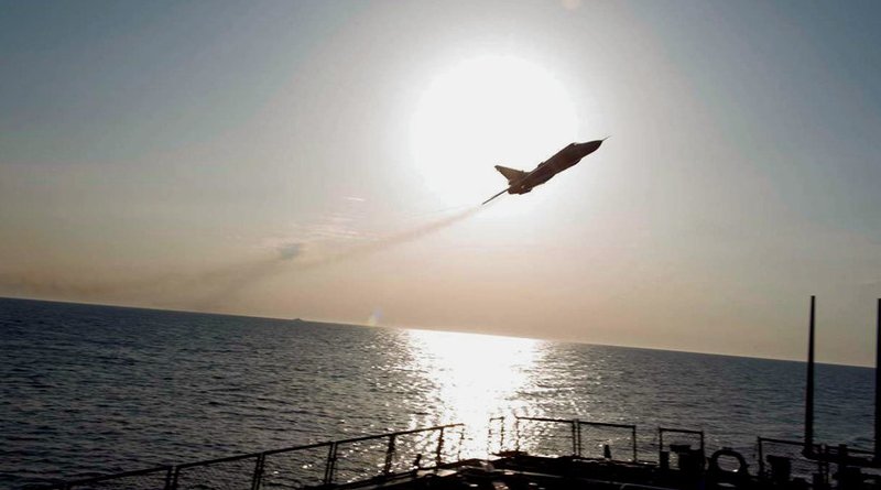 A Russian Sukhoi SU-24 attack aircraft makes a low-altitude pass by the USS Donald Cook. A guided-missile destroyer, the Cook was conducting a routine patrol in the U.S. 6th Fleet area of operations in support of national security interests in Europe. (U.S. Navy)