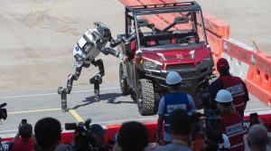 RoboSimian from Jet Propulsion Laboratory exits vehicle during DARPA Robotics Challenge, June 5, 2015, in Pomona, California (U.S. Navy/John F. Williams)