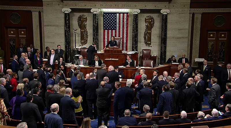 On December 18, 2019, United States House of Representatives votes to adopt the articles of impeachment, accusing Donald Trump of abuse of power and obstruction of Congress. Photo Credit: United States House of Representatives, Wikipedia Commons.