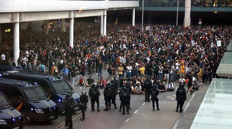 Catalan protestors at Barcelona airport. Photo Credit: Medol, Wikipedia Commons