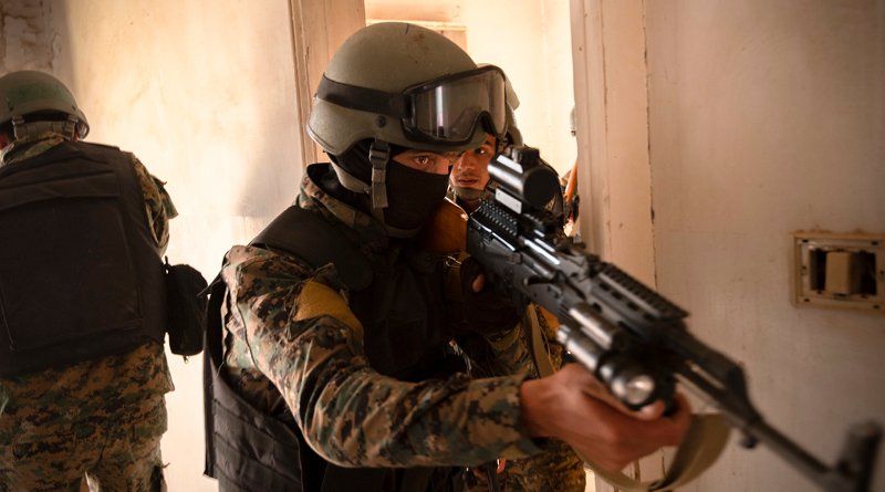 Syrian Democratic Forces commando cadets clear a room during training for military operations in urban terrain in Syria. Photo Credit: Army Spc. Alec Dionne