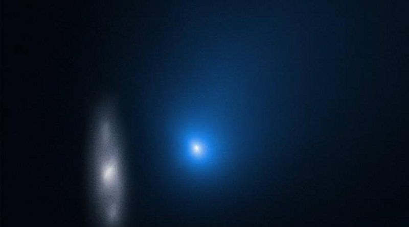 Comet 2I/Borisov is only the second interstellar object known to have passed through our Solar System. In this image taken by the NASA/ESA Hubble Space Telescope, the comet appears in front of a distant background spiral galaxy. CREDIT NASA, ESA, and D. Jewitt (UCLA)