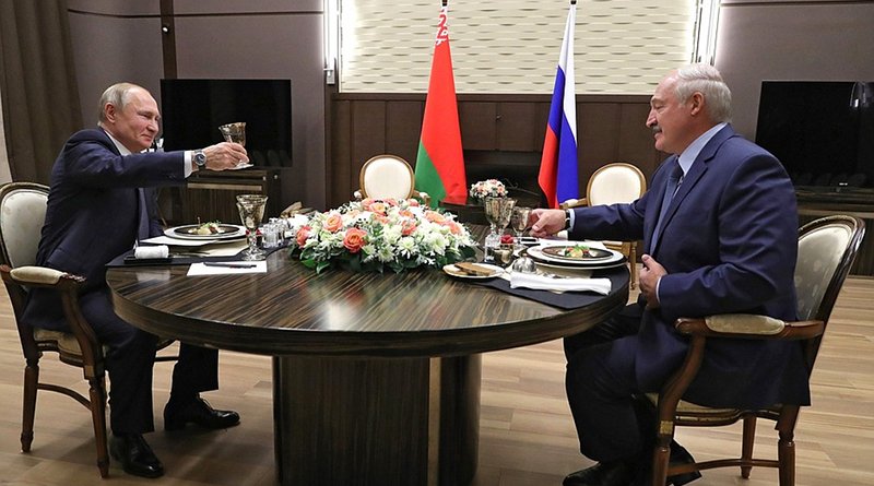 Russia's President Vladimir Putin with President of Belarus Alexander Lukashenko during a working dinner. Photo Credit: Kremlin.ru