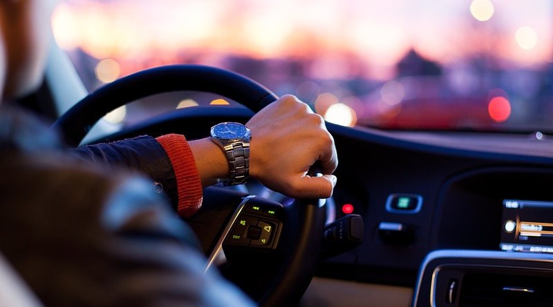 man driving car dashboard