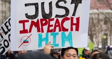 Protesters calling for impeachment on the day of Trump's inauguration. Photo Credit: Mark Dixon, Wikipedia Commons