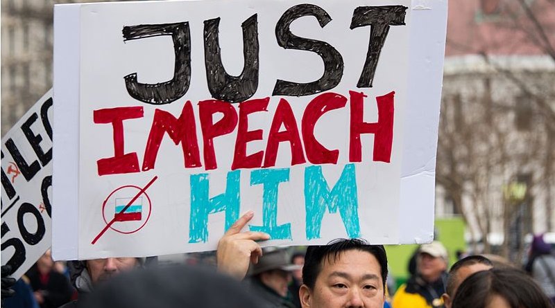 Protesters calling for impeachment on the day of Trump's inauguration. Photo Credit: Mark Dixon, Wikipedia Commons