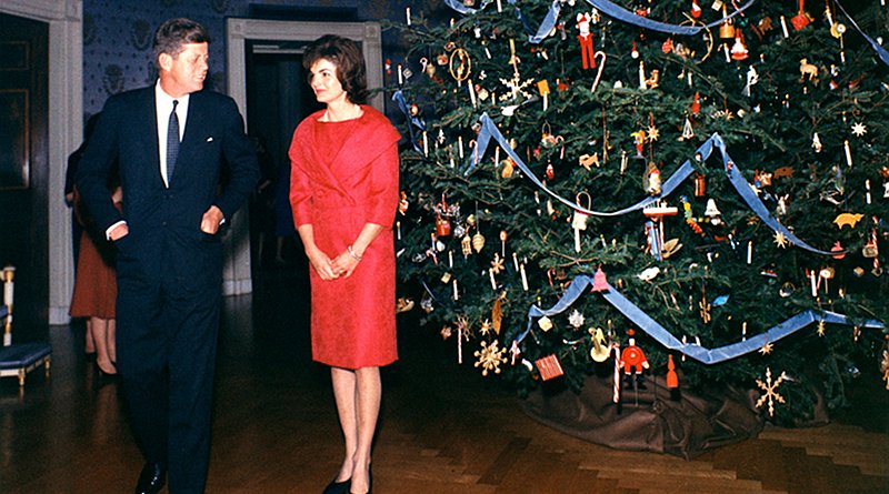 President John F. Kennedy and First Lady Jacqueline Kennedy with the first themed Blue Room tree in 1961. Photo Credit: The White House, Kennedy Library, Wikipedia Commons