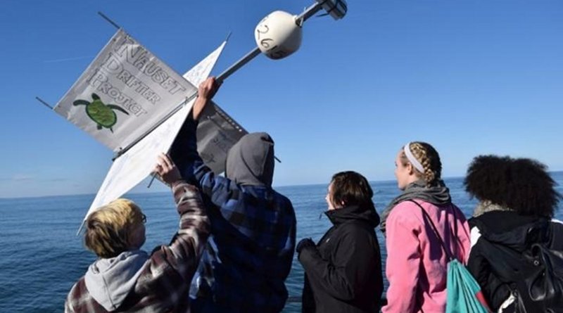 High school students from Nauset Regional High School in Eastham, Massachusetts releasing a drifter into Cape Cod Bay in 2016. Mass Audubon's Wellfleet Bay Wildlife Sanctuary worked with the students to study surface currents relative to sea turtle strandings in the fall. CREDIT Olivia Bourque