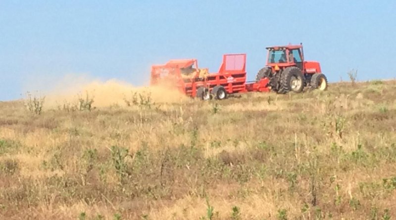 Sprayers, like this one, can distribute many materials across crops. In this research study, the team applied inactivated spent microbial mass (SMB) and measured maize yields over two growing seasons and changes in soil carbon. CREDIT Photo by D. O'Dell, courtesy UTIA.