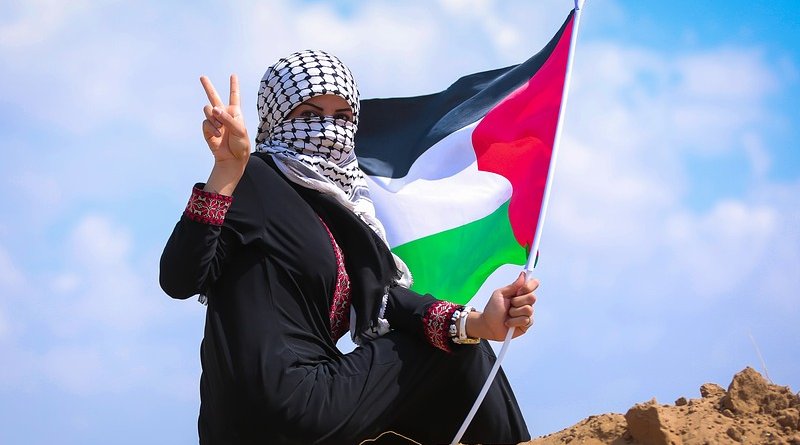 palestine woman gaza peace flag