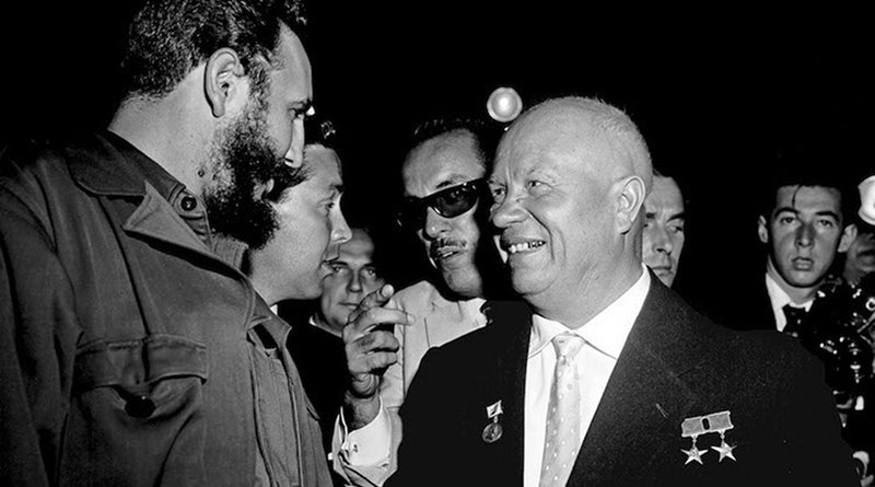 In the Assembly Hall shortly before the meeting got under way, Premier N.S. Khrushchev (right), Chairman of the Council of Ministers of the USSR, and Premier Fidel Castro, of Cuba, are seen greeting each other. UN Photo. 20 September 1960. United Nations, New York.