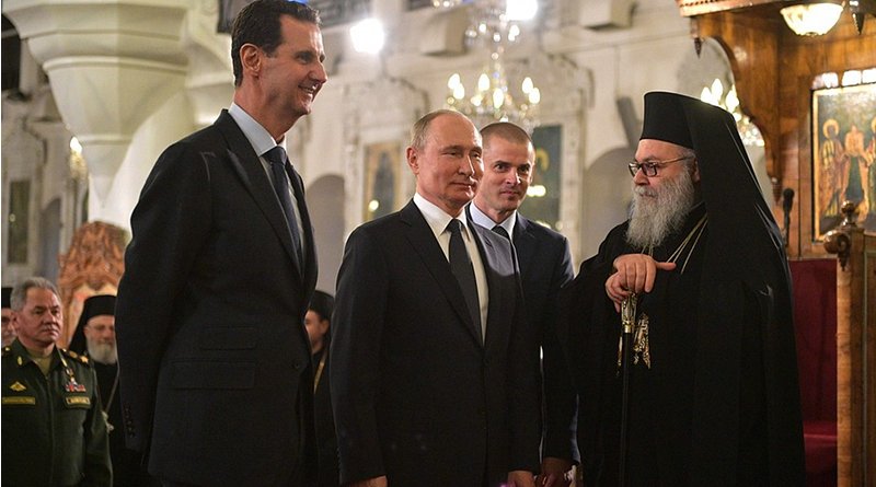 Russia's President Vladimir Putin at the Orthodox Mariamite Cathedral of Damascus, with Patriarch John X of Antioch and All the East. Left, Syrian President Bashar al-Assad. Photo Credit: Kremlin.ru
